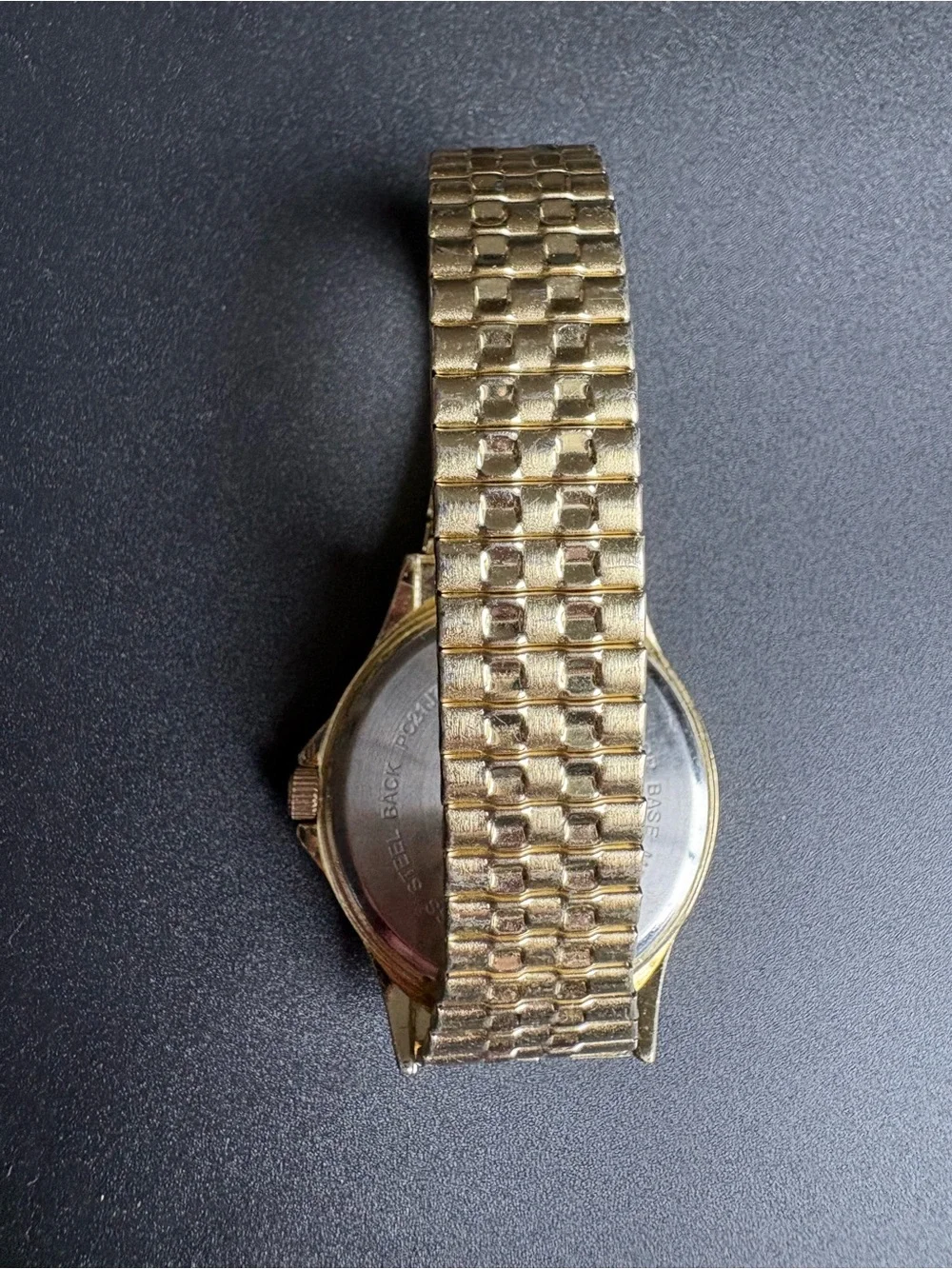 Gold Tone Watch with Black Dial